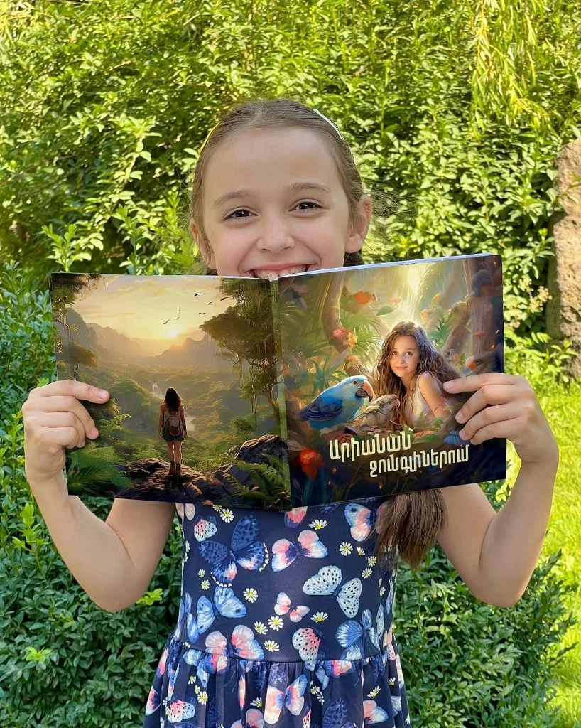 Ariana with her book, “Ariana in the Jungle”